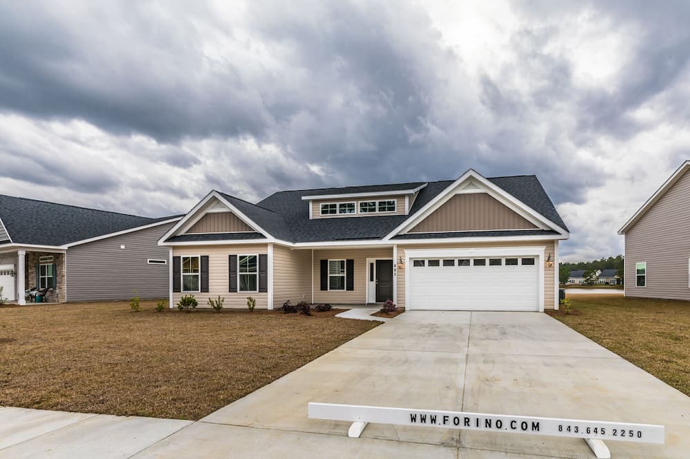 Tan home Hearthstone Lakes